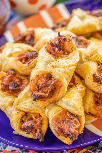 Pork Puff Pastry, cooked on blue plate